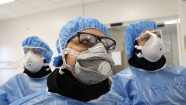 Health professionals in Iran wearing PPE